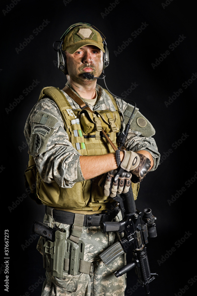 Soldier posing with a gun Soldier posing with a gun