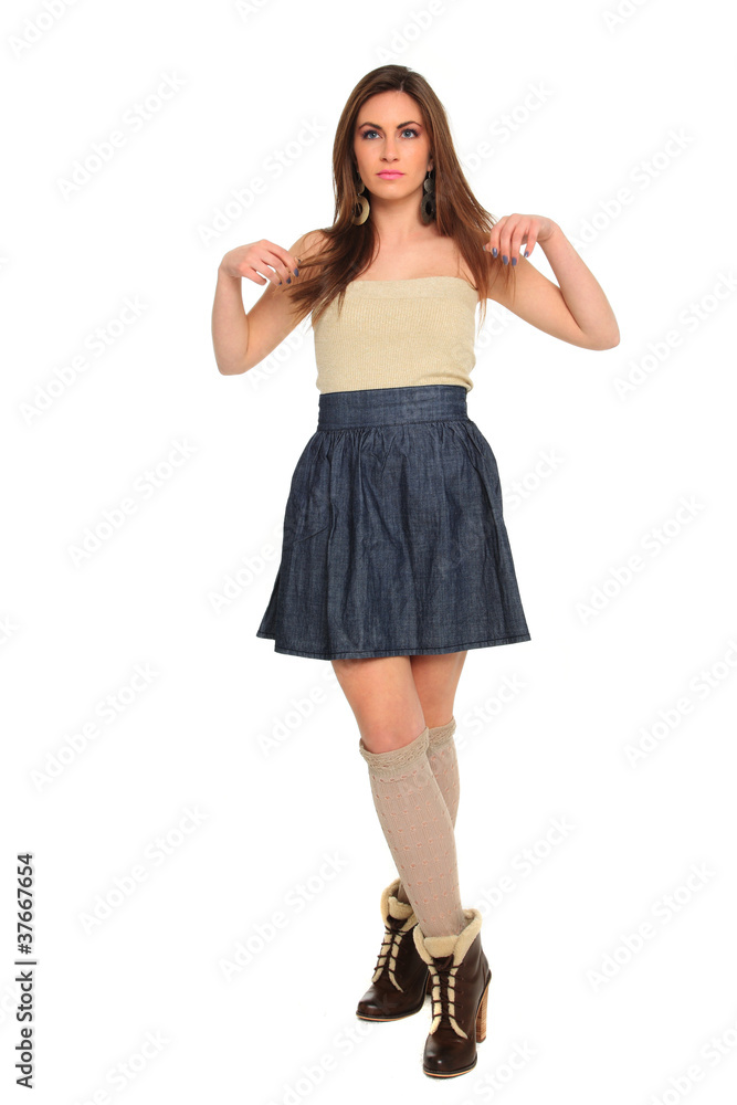 Fototapeta premium Beautiful young woman wearing a blue skirt