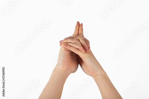 A womans hand is shown in yoga gesture