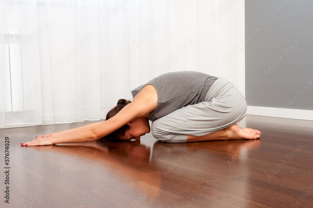 Fototapeta premium woman doing daily yoga