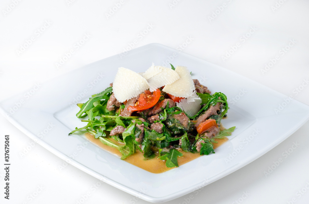Beef steak with rucola and parmesan Beef steak with rucola and parmesan