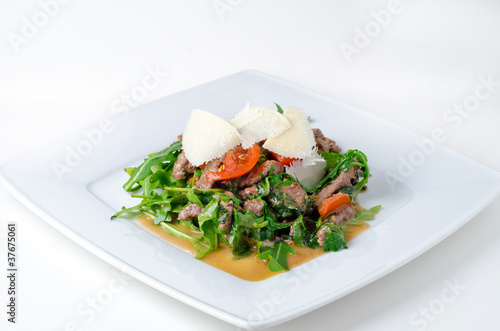 Beef steak with rucola and parmesan