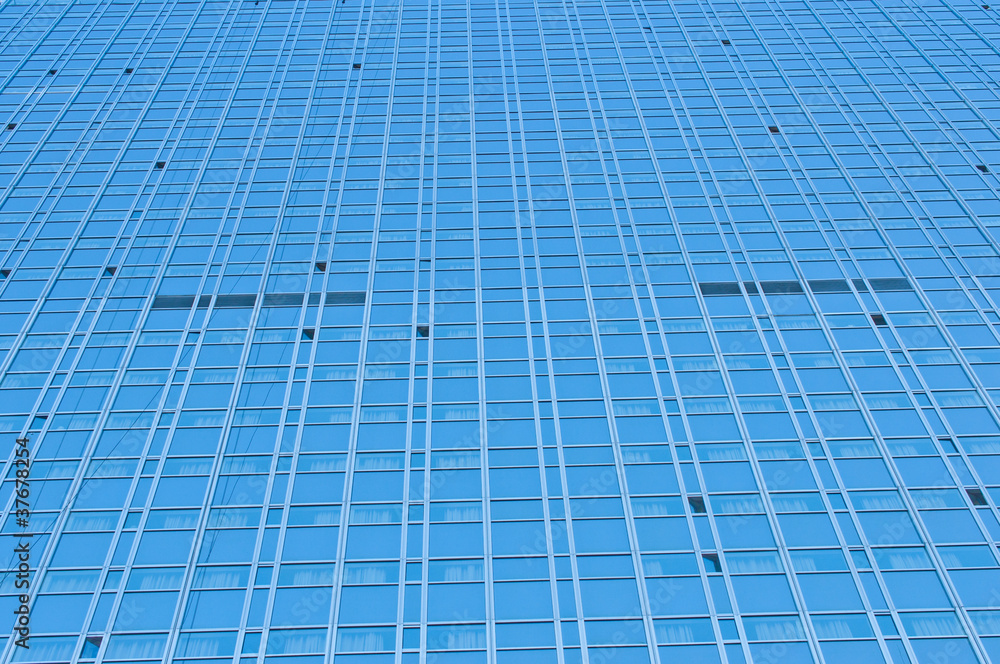 Modern skyscraper made of glass  close up