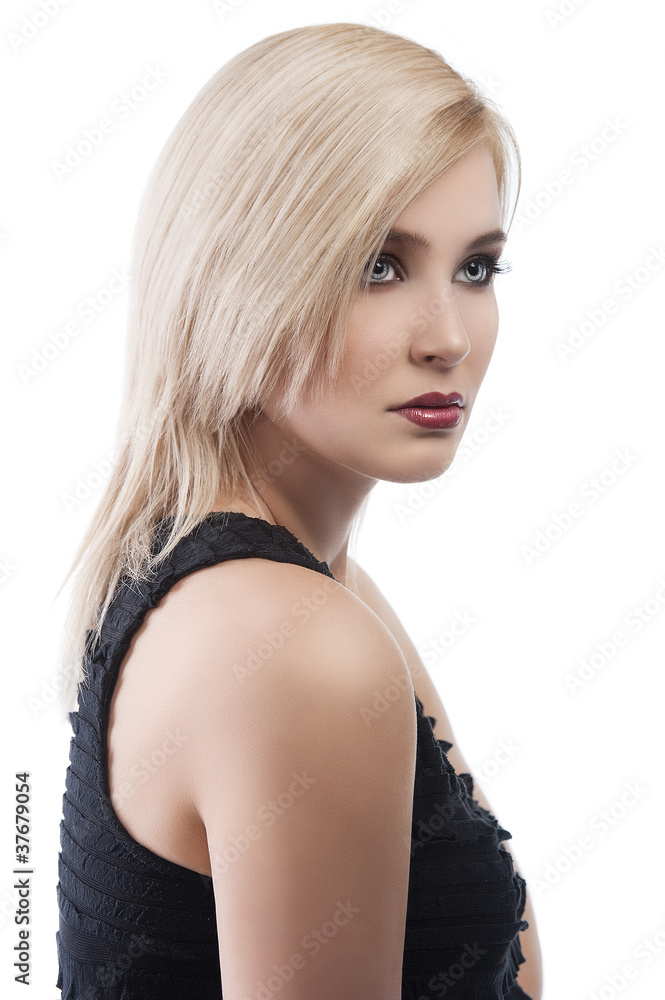 Fototapeta premium girl in elegant evening dress, she is turned of three quarters