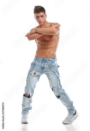 Sexy naked young dancer in jeans