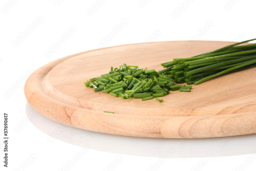 beautiful green onion chives on wooden board isolated on white beautiful green onion chives on wooden board isolated on white