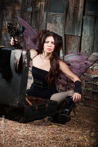 Frustrated Fairy Holds Black Roses photo