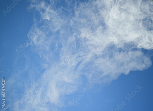 White smoke on blue background