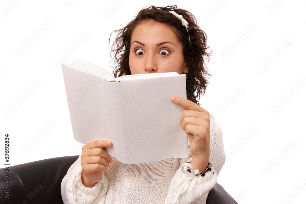Young woman reading book isolated on white Young woman reading book isolated on white