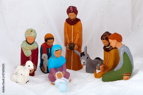 Valokuvatapetti Figures representing nativity scene on white background