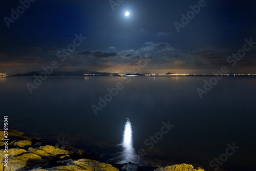 Night Scene beautiful sea and clouds illuminated by the moon