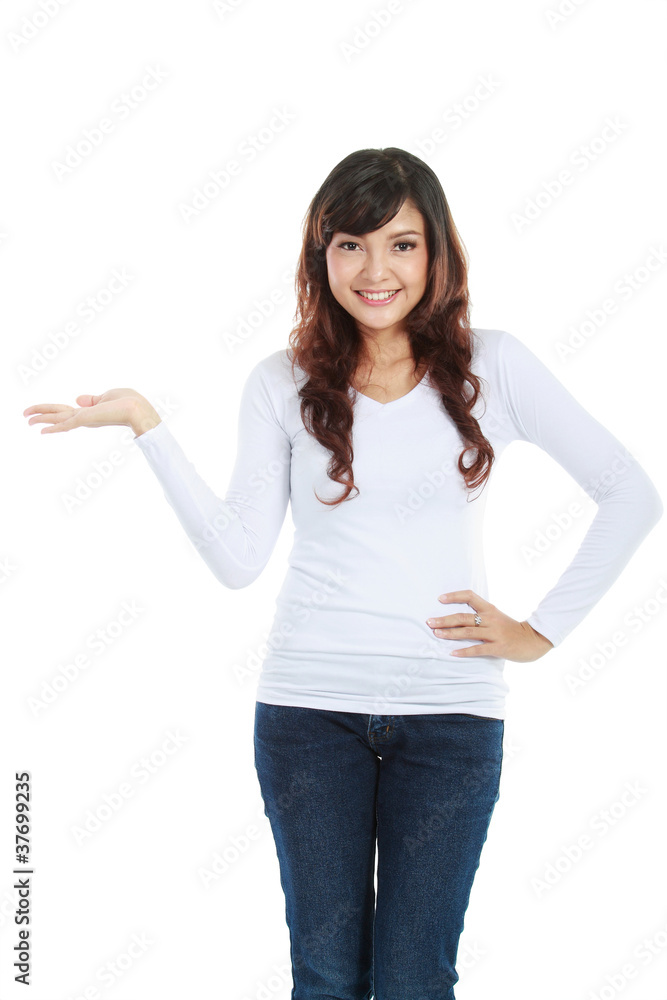 young woman showing a imaginary product young woman showing a imaginary product