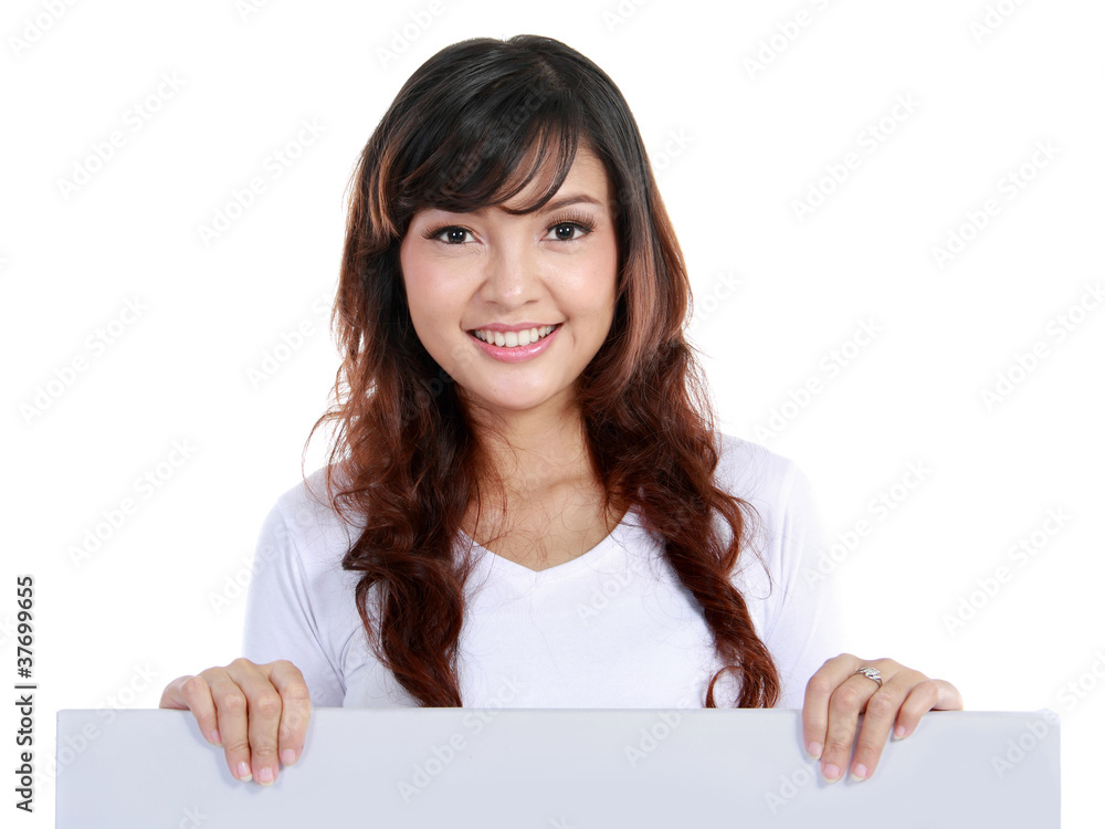 beautiful woman holding a blank billboard. beautiful woman holding a blank billboard.