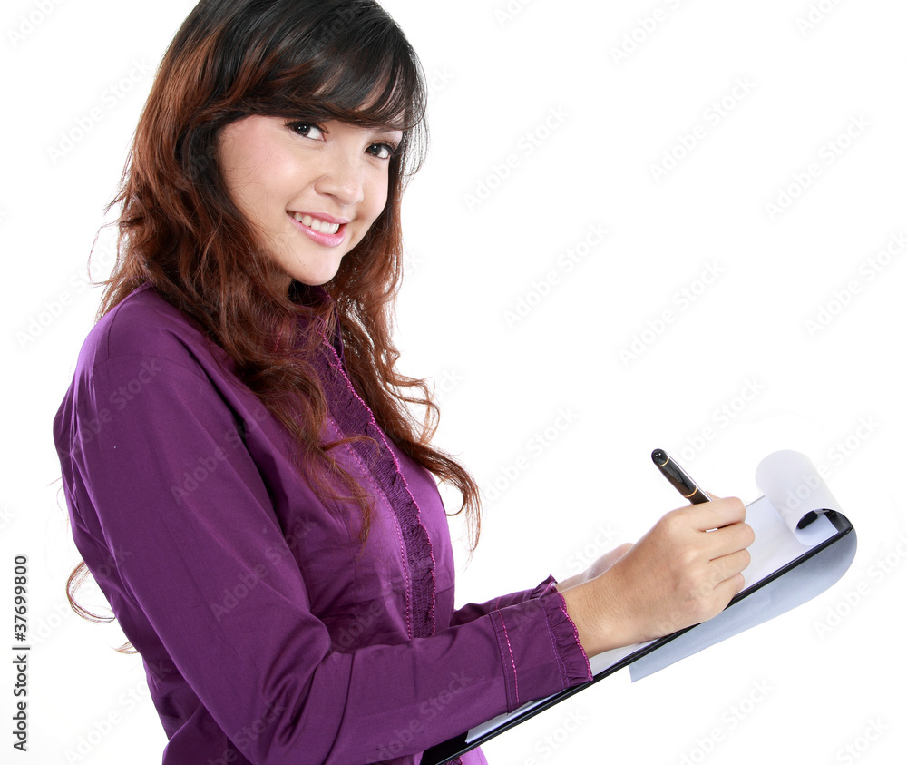 business woman writing on document business woman writing on document