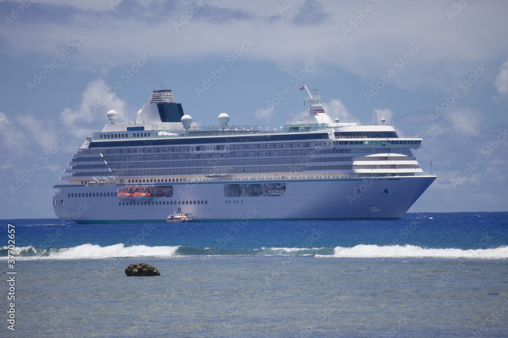 Cruise Ship anchored behind Coral Reef