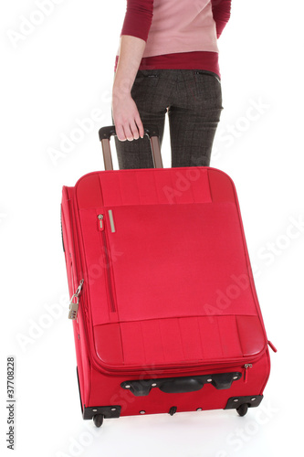 traveller with a suitcase isolated on white