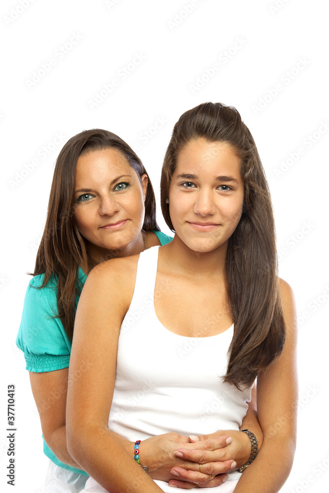 Middle-aged mother hugging her daughter Middle-aged mother hugging her daughter
