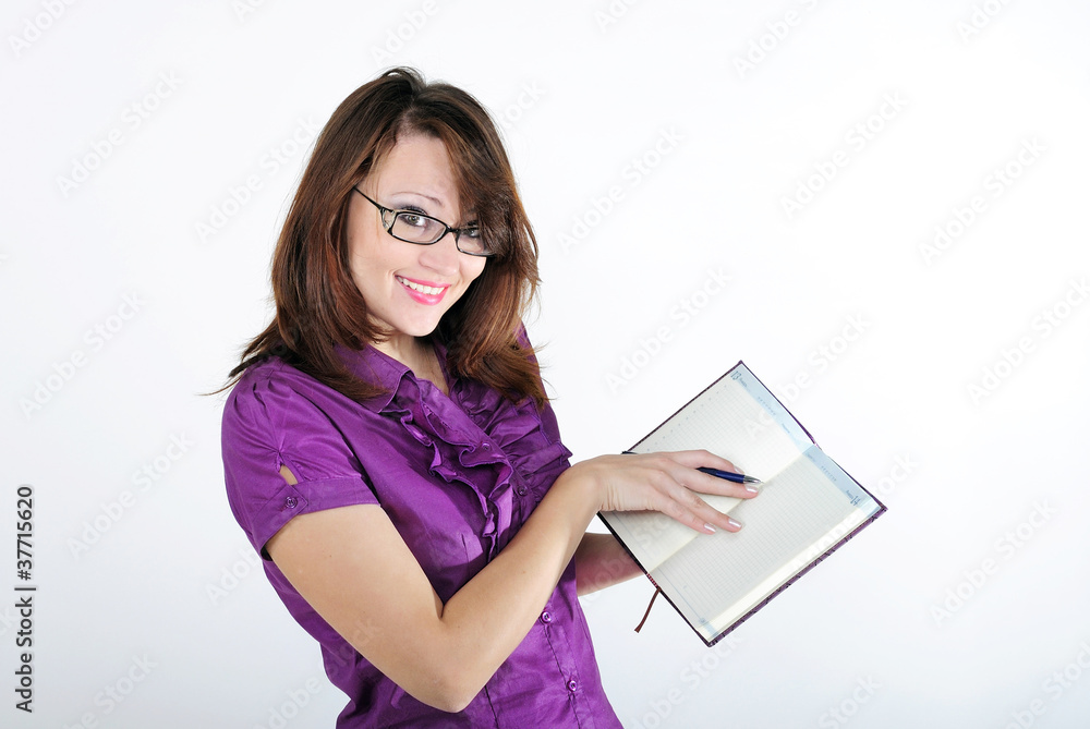 The young beautiful bright girl with the daily log The young beautiful bright girl with the daily log