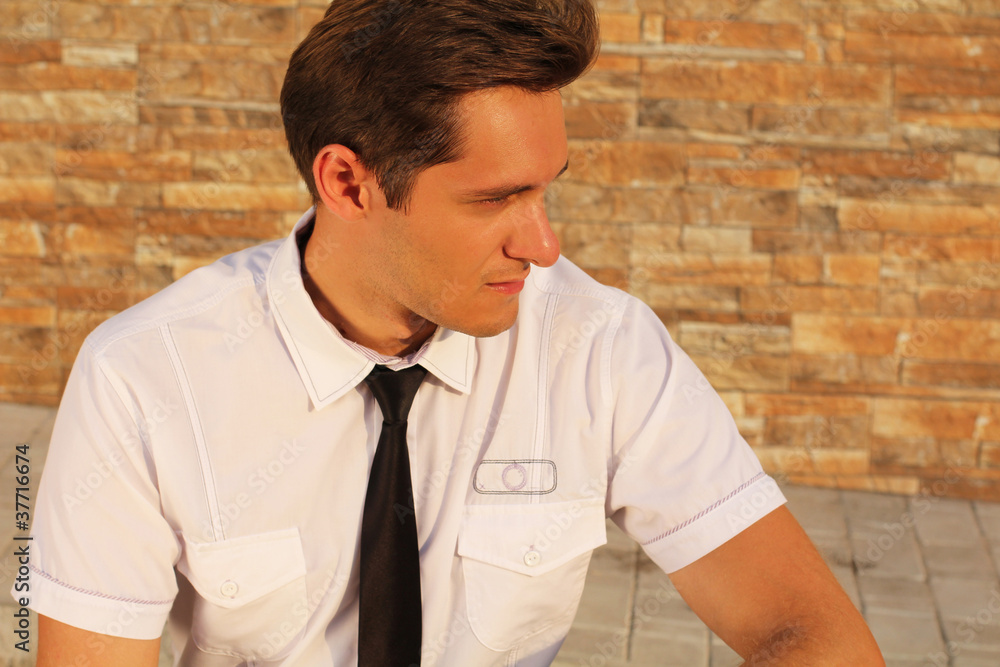 Closeup portrait of a handsome young man, looking away Closeup portrait of a handsome young man, looking away
