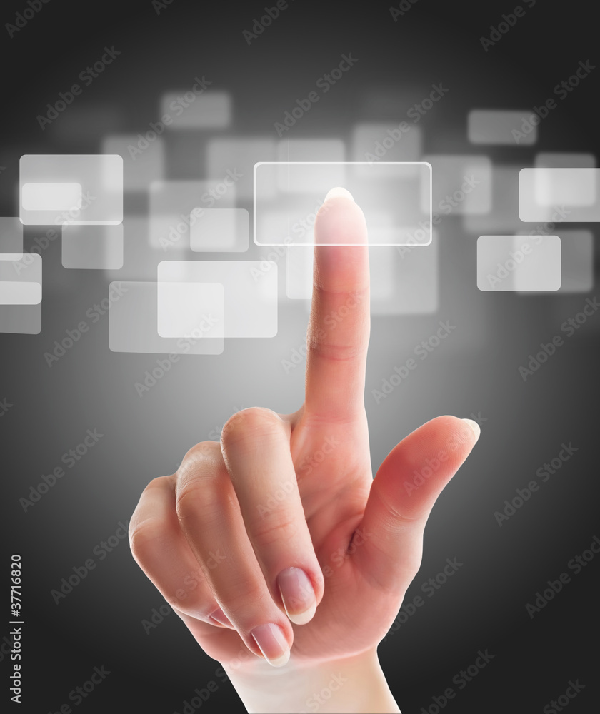 hand pushing a button on a touch screen interface hand pushing a button on a touch screen interface