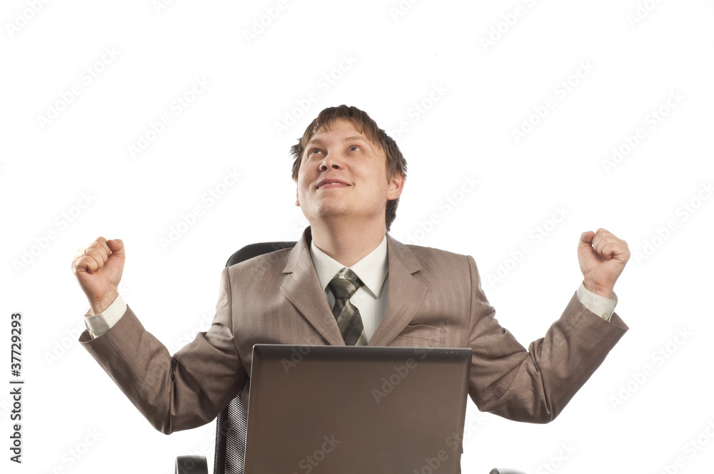 Happy executive raising fists in excitement Happy executive raising fists in excitement