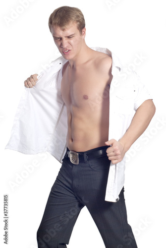 Young handsome male model in white shirt posing