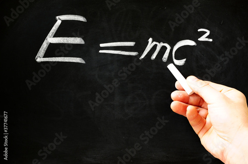 Fototapeta E=mc² Albert Einsteins physical formula on blackboard