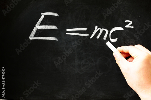 Naklejka E=mc² Albert Einsteins physical formula on blackboard