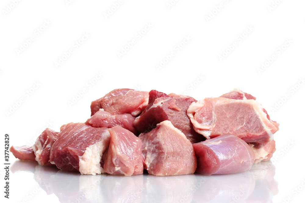 Pieces of raw meat isolated on white Pieces of raw meat isolated on white