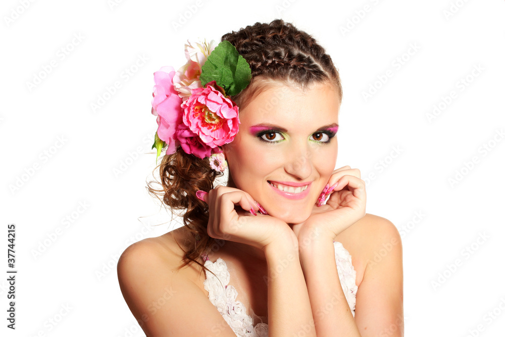 Beautiful girl with flowers in her hair isolated