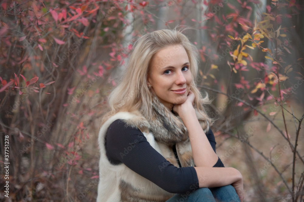 girl on a walk in the autumn park girl on a walk in the autumn park
