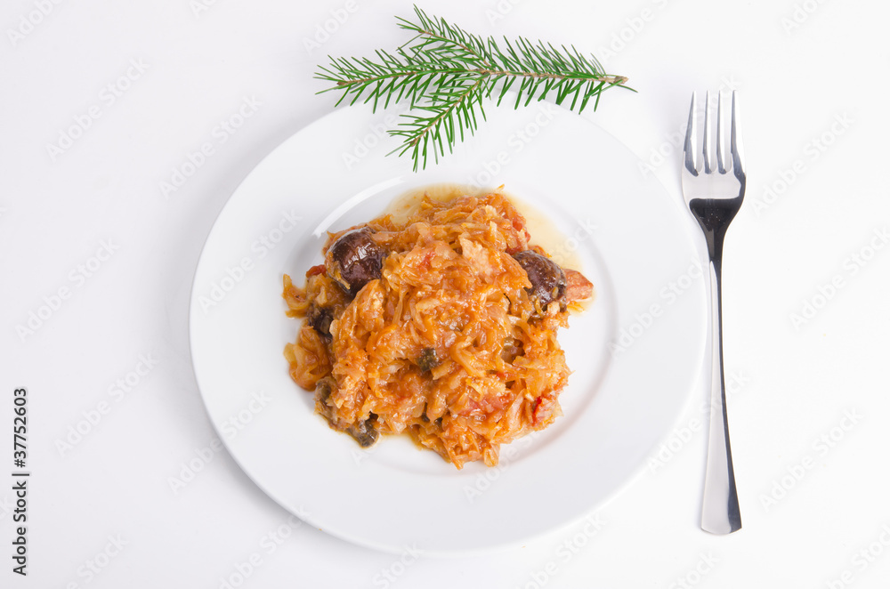 Sauerkraut auf polnische art mit geräuchertem Fleisch Sauerkraut auf polnische art mit geräuchertem Fleisch