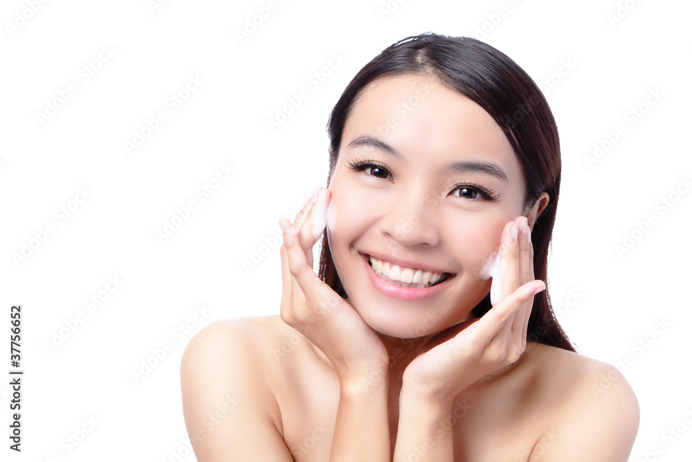 Beautiful asian woman washing her beauty face