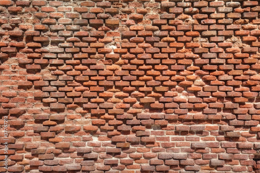 Old weathered brick wall as texture. Old weathered brick wall as texture.