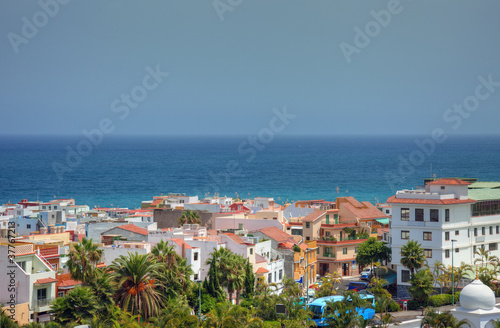 Shoreline of Atlantic ocean, cityscape view of Tenerife island.