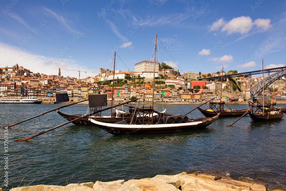 Ancient transporting wine boats at Douro river in oPorto, north