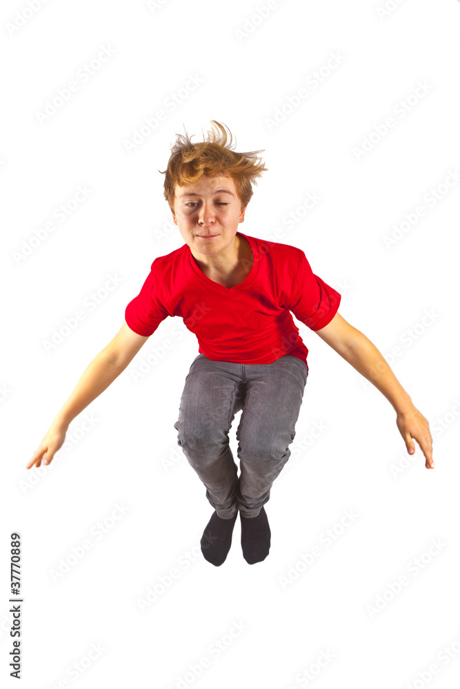 happy boy with red shirt jumping