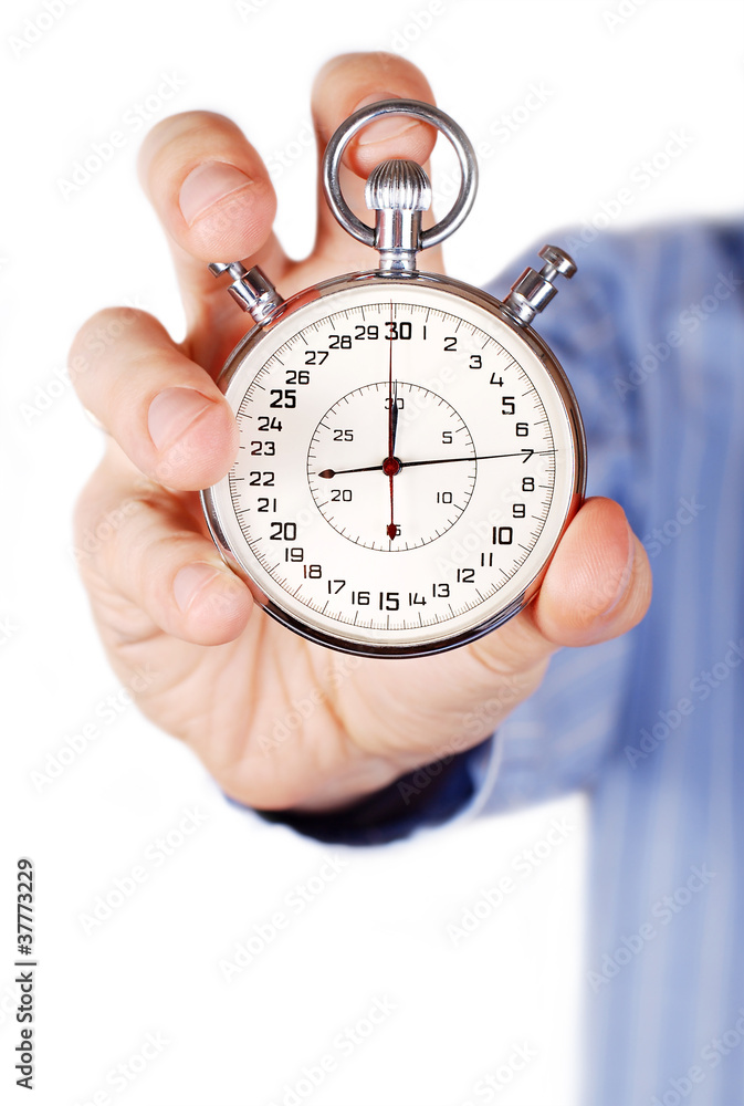 Sport timer in outstretched hand Sport timer in outstretched hand