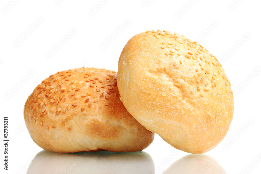 delicious buns with sesame seeds isolated on white