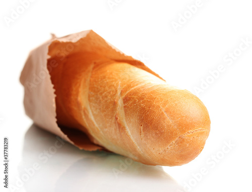 delicious baguette in paper bag isolated on white