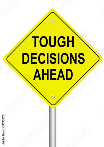 Road Sign: Tough Decisions Ahead