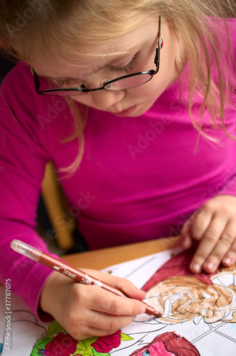 Kid with coloring book