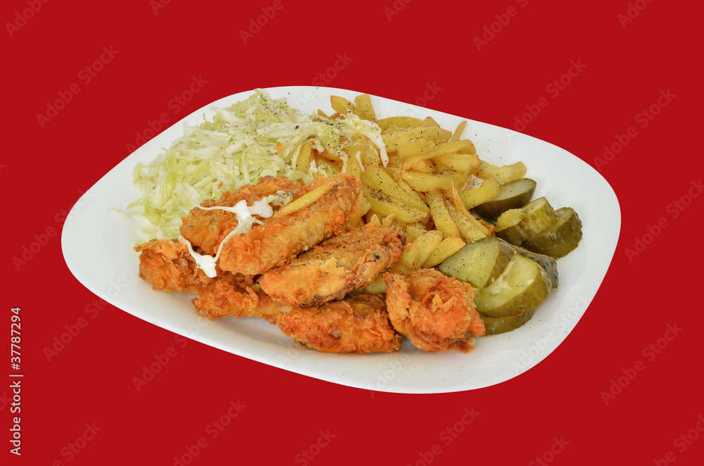 Roasted chicken wings with french fries and salad Roasted chicken wings with french fries and salad
