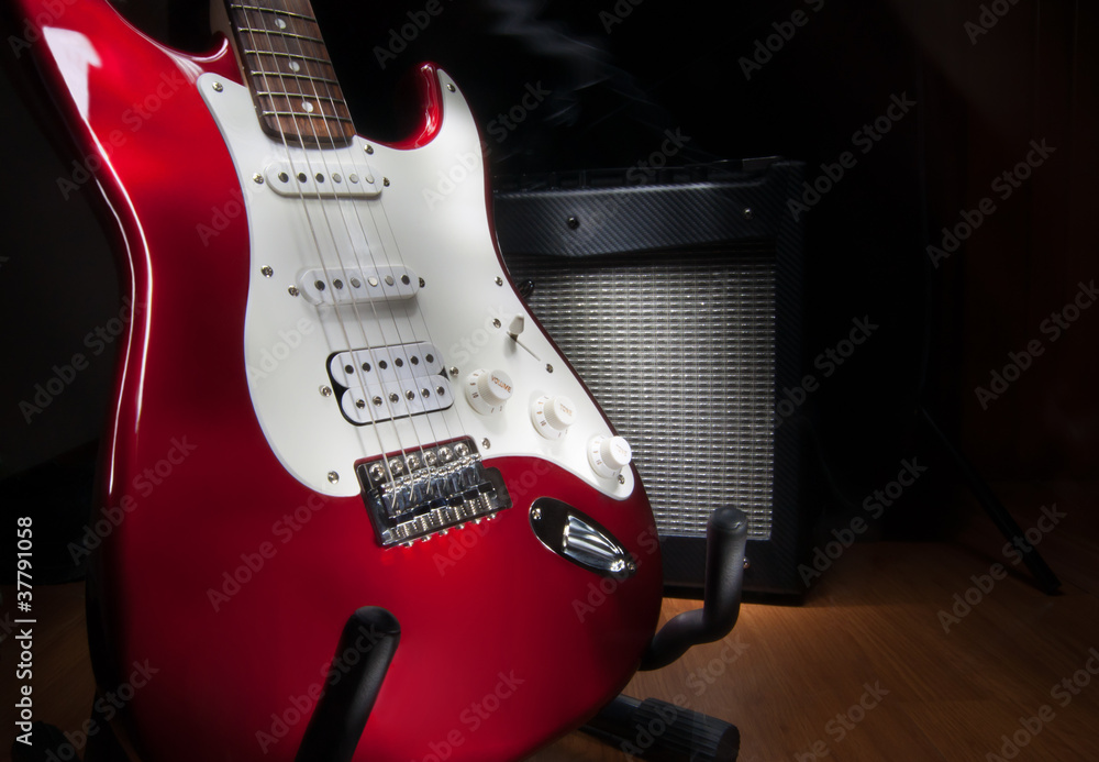 Fototapeta premium red and white electric guitar