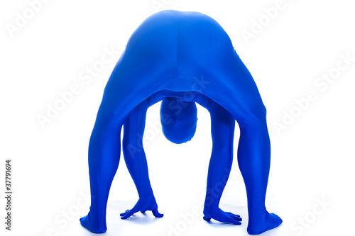 Faceless blue man bent over looking between his legs
