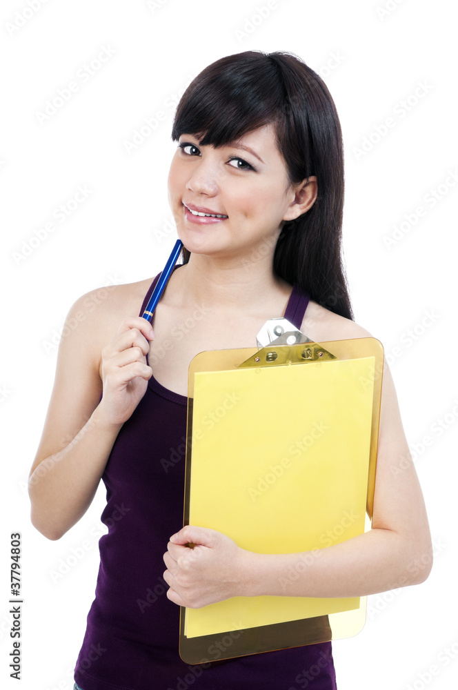Cute Young Female Student Holding Clipboard And Pen Cute Young Female Student Holding Clipboard And Pen