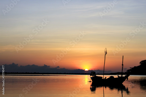 boat in the sunrise