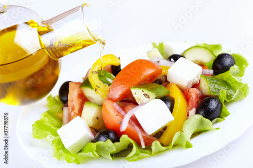 Vegetable salad with cheese and olive oil