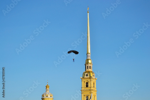 The spire of Peter and Paul Fortress and parachutist