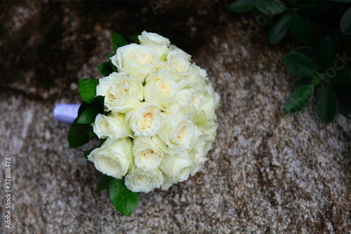 wedding bouquet of white roses.